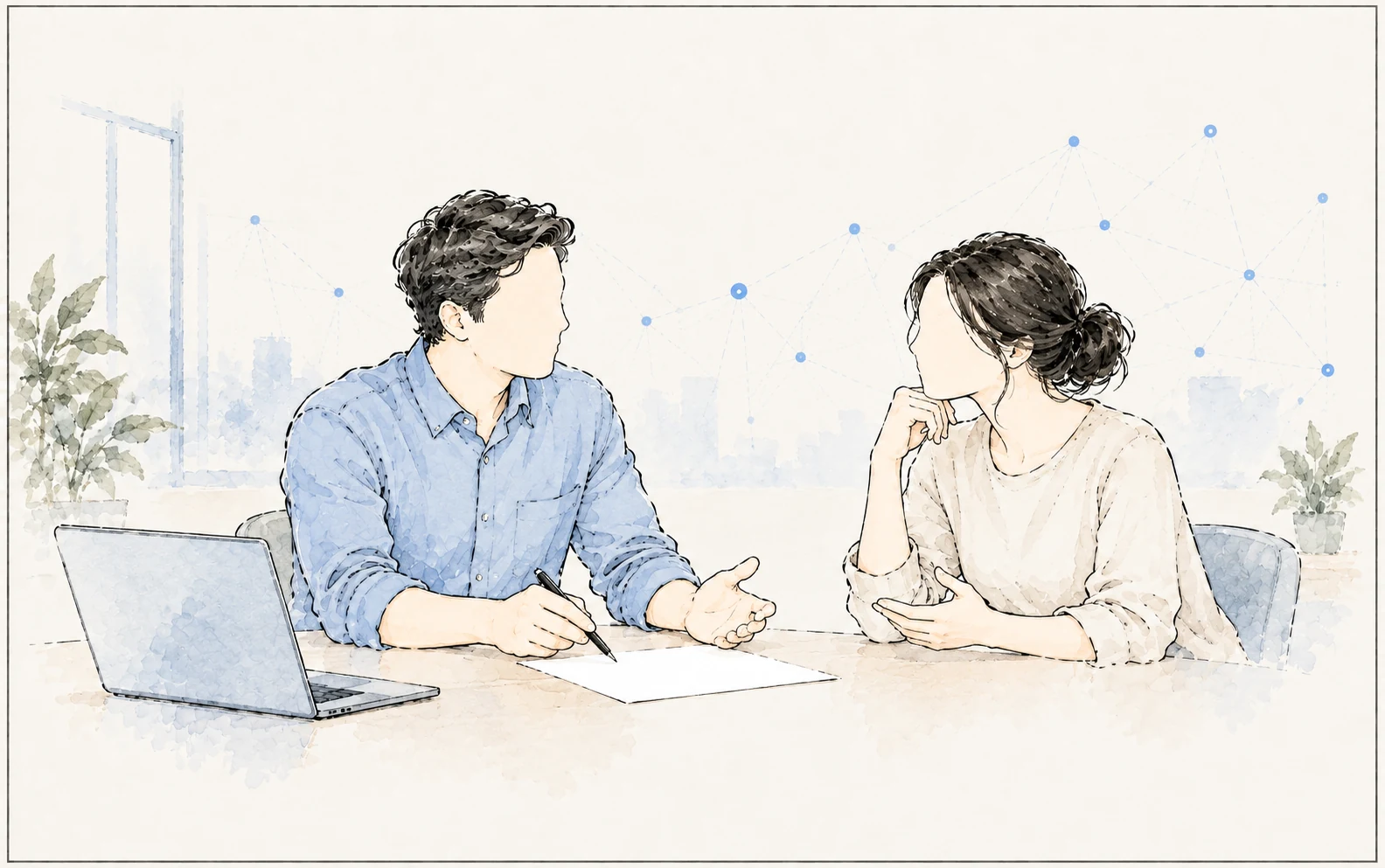 An advisor and client clarify a question together over a blank page, with a laptop beside them.